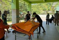 Jenazah pekerja lahan kelapa sawit di Kabupaten Mamuju Tengah, Sulawesi Barat. (Istimewa)